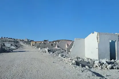 Çekdarên SNAyê berî derketinê kampa li Efrînê hilweşandin 